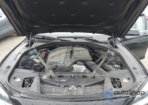 2015 BMW 740Li из США, поврежденный, VIN WBAYE4C51FD946965